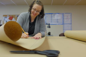 Anne Piano works on drafting costumes for Opera Colorado's 2016 production of The Scarlet Letter. Photo: Opera Colorado/Matthew Staver