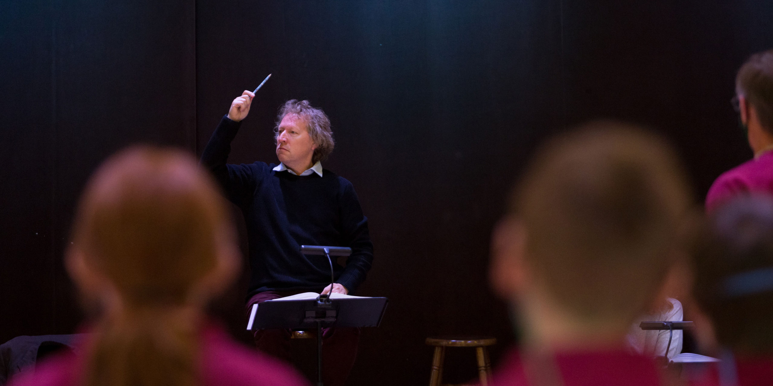 Opera Colorado Music Director Ari Pelto conducts a chorus rehearsal.  Photo: Opera Colorado/Jamie Kraus