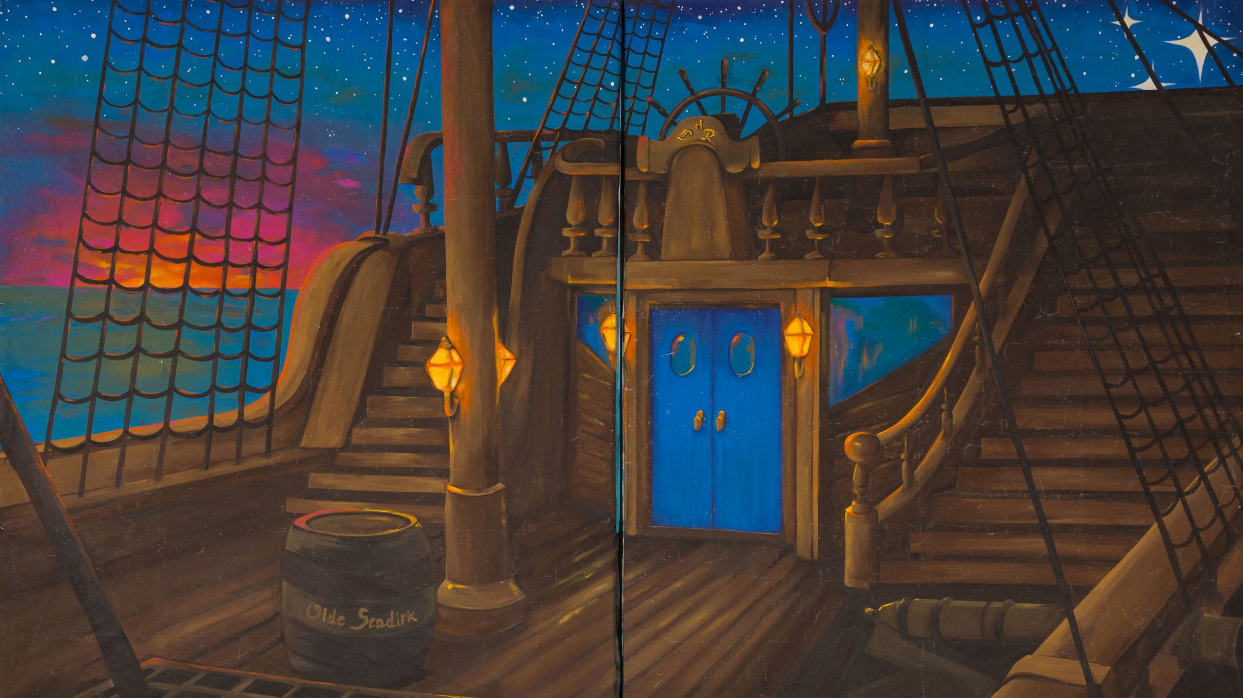 The ship scenery for The Pirates of Penzance featuring a ship with a late sunset background
