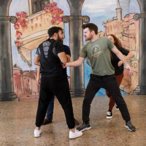 Two men rehearsing a fight scene