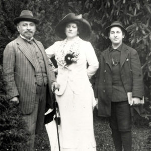 Black and white photo of a man and a woman with their young son.